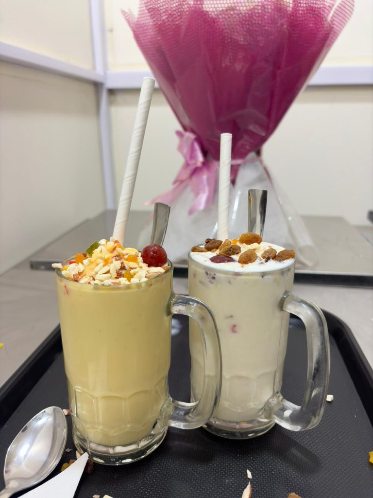 Mango and vanilla shake duo on serving tray